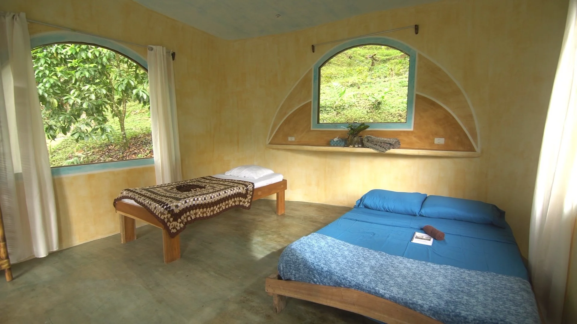 Florestral cabin interior with multiple beds